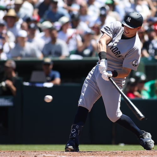 New York Yankees' Ben Rice hits an two-RBI triple during the third inning of a baseball game against the Athletics, Sunday, May 31, 2026, in West Sacramento, Calif. (AP Photo/Scott Marshall)