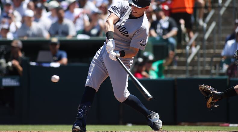 New York Yankees' Ben Rice hits an two-RBI triple during the third inning of a baseball game against the Athletics, Sunday, May 31, 2026, in West Sacramento, Calif. (AP Photo/Scott Marshall)