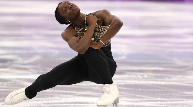 Mae Berenice Meite of France glides across the ice during her Sunday program at the Winter Olympics.