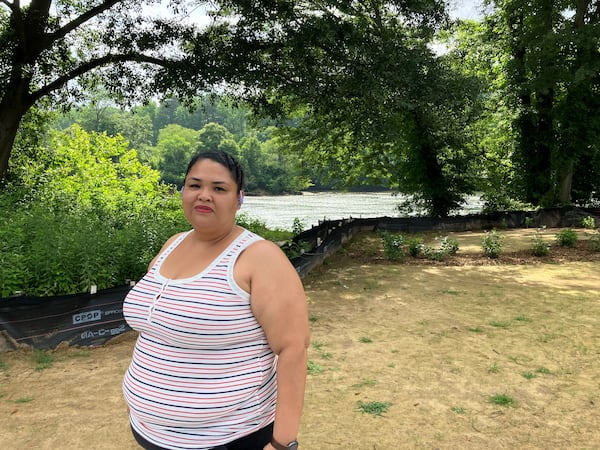 Shawnia Da Cruz, 47, of Vinings, has been visiting Paces Mill Park for a decade and likes taking walks in the shade by the Chattahoochee River. (Reed Williams)