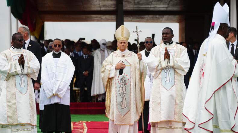 Pope Leo XIV arrives in procession to celebrate Mass at Yaounde Ville Airport, Cameroon, Saturday, April 18, 2026 on the sixth day of his 11-day pastoral visit to Africa. (AP Photo/Andrew Medichini)