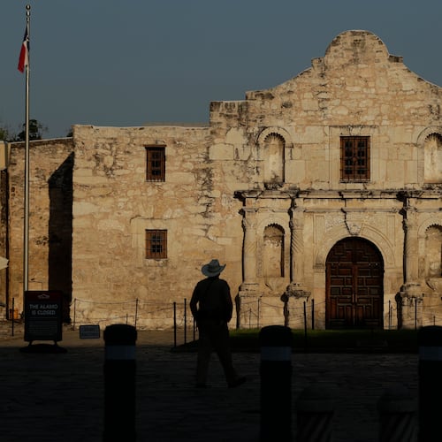FILE - A ranger patrols the ground of the Alamo in San Antonio, Thursday, March 26, 2020.  (AP Photo/Eric Gay, File)