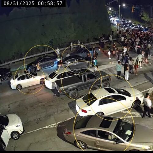 In video from Brookhaven PD's Instagram account, street racers shut down the intersection of Ashford Dunwoody Road and Harts Mill Road on the night of Aug. 31, 2025. (Courtesy of Brookhaven Police Department)