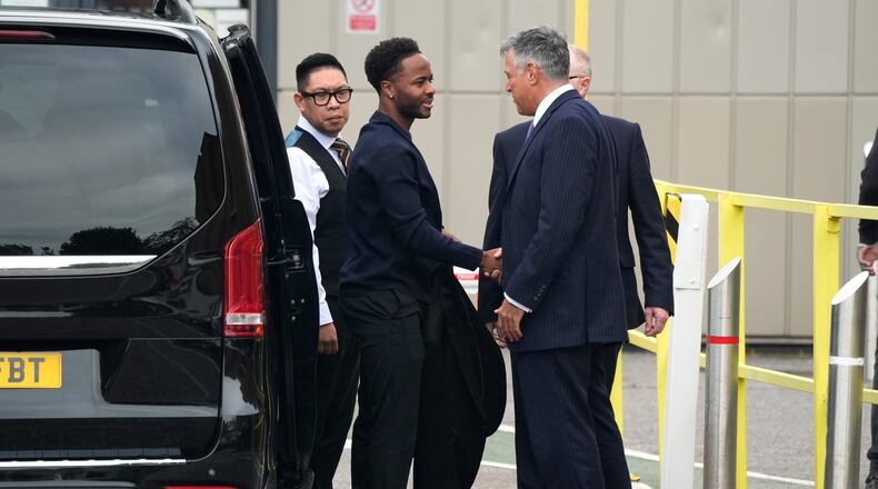 Former England soccer player Raheem Sterling, second left, arrives at Basingstoke Magistrates' Court ahead of his first appearance accused of dangerous driving in Hampshire, England, Tuesday, Sept. 15, 2026. (Andrew Matthews/PA via AP)