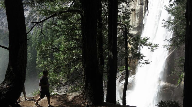 Visitors to Yosemite National Park hike the Vernal Fall trail. Horsetail Fall is the waterfall where the 'firefall' illusion occurs in February,