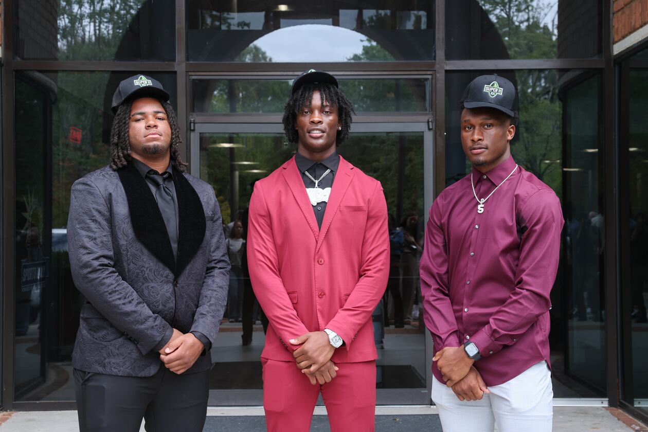 From left, AJC Super 11 selections Elijah Patmon of Northside, Kamarui Dorsey of Hampton and Jaden Upshaw of Lee County are all committed to play for Texas A&M. The last time three or more AJC Super 11 players signed with the same school was the 2023 Super 11 class. (Arvin Temkar/AJC)