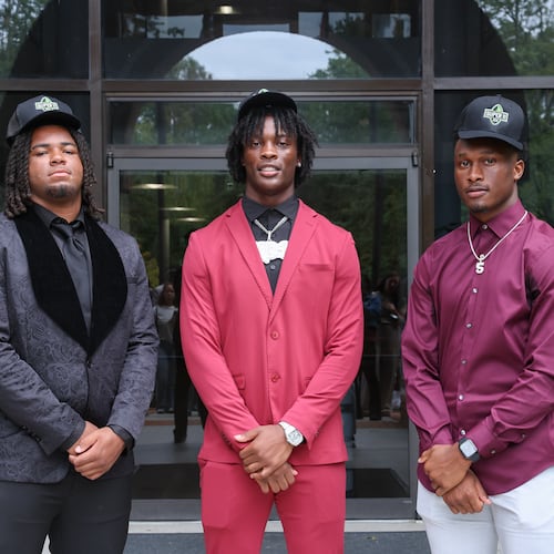 From left, AJC Super 11 selections Elijah Patmon of Northside, Kamarui Dorsey of Hampton and Jaden Upshaw of Lee County are all committed to play for Texas A&M. The last time three or more AJC Super 11 players signed with the same school was the 2023 Super 11 class. (Arvin Temkar/AJC)