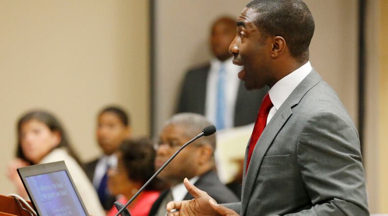 Interim DeKalb CEO Lee May speaks to the DeKalb Commission. BOB ANDRES / BANDRES@AJC.COM