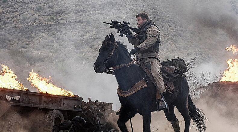 Chris Hemsworth stars in “12 Strong.” Contributed by Warner Bros. Entertainment
