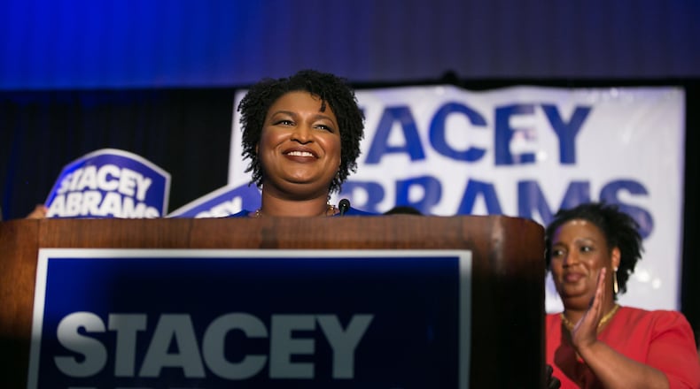 Stacey Abrams takes the stage to claim the Democratic nomination for governor of Georgia on Tuesday. Jessica McGowan/Getty Images