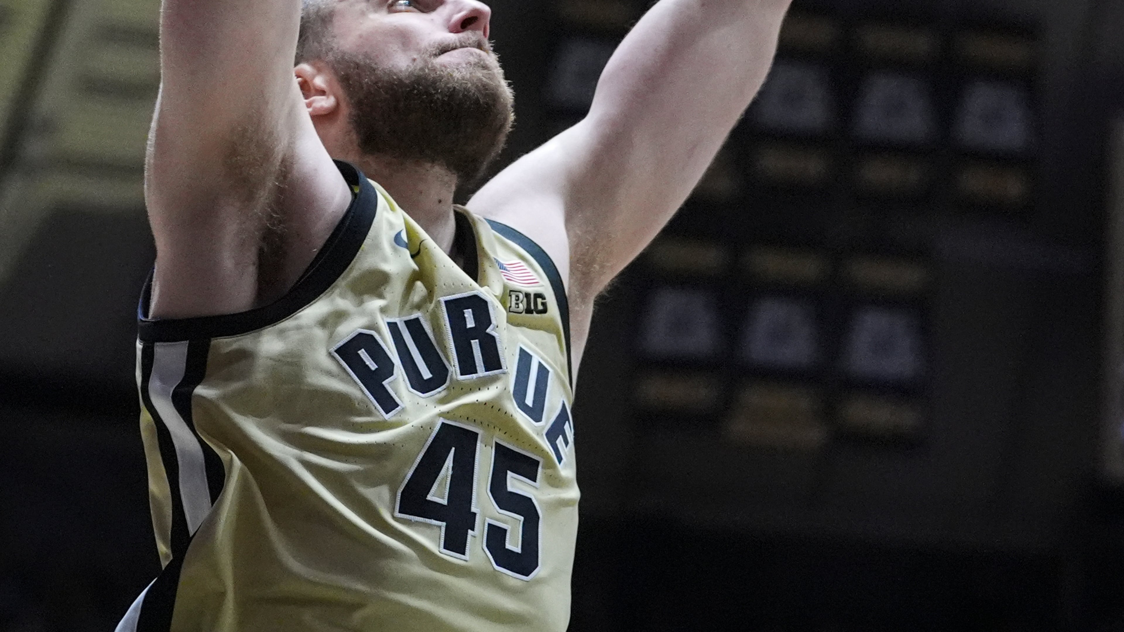 Purdue center Oscar Cluff (45) gets a basket on a dunk against Marquette during the second half of an NCAA college basketball game in West Lafayette, Ind., Saturday, Dec. 13, 2025. (AP Photo/Michael Conroy)