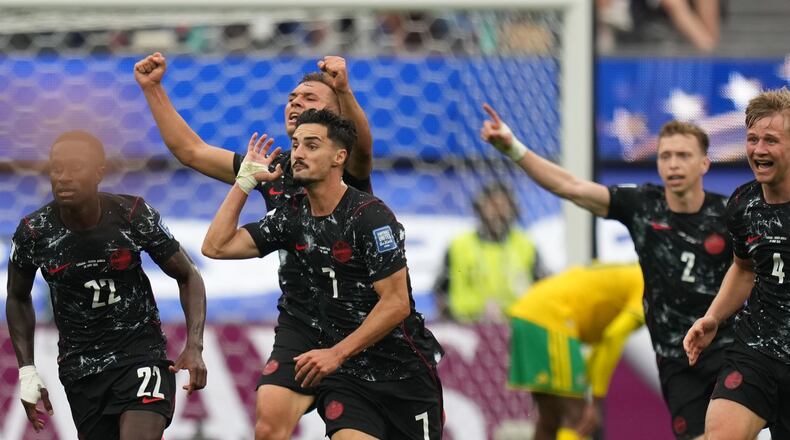 Canada's Stephen Eustaquio (7) celebrates scoring their opening goal against South Africa during the World Cup round of 32 soccer match in Inglewood, Calif., near Los Angeles, Sunday, June 28, 2026. (AP Photo/Andre Penner)