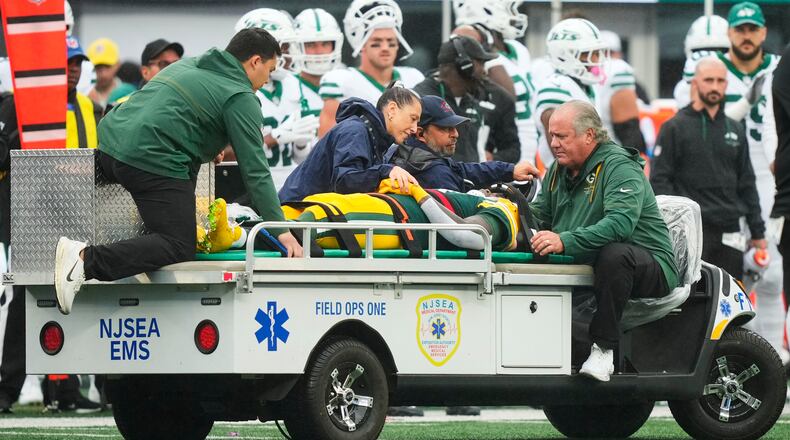 Green Bay Packers wide receiver Jayden Reed (11) is taken off the field following an injury during an NFL football game againt the New York Jets in East Rutherford, N.J., Sunday, Sept. 20, 2026. (AP Photo/Yuki Iwamura)