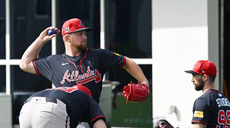 Atlanta Braves pitcher Spencer Schwellenbach warms during spring training workouts at CoolToday Park, Sunday, February 16, 2025, North Port, Florida. (Hyosub Shin / AJC)