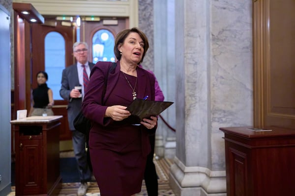 Sen. Amy Klobuchar, D-Minn., passes a police checkpoint as she arrives for a closed-door security briefing for lawmakers following Saturday's political violence in Minnesota, at the Capitol in Washington, Tuesday, June 17, 2025. (AP Photo/J. Scott Applewhite)