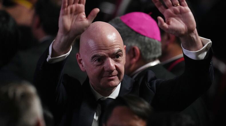 FIFA President Gianni Infantino arrives for the inauguration of President Abelardo de la Espriella in Cali, Colombia, Friday, Aug. 7, 2026. (AP Photo/Matias Delacroix)