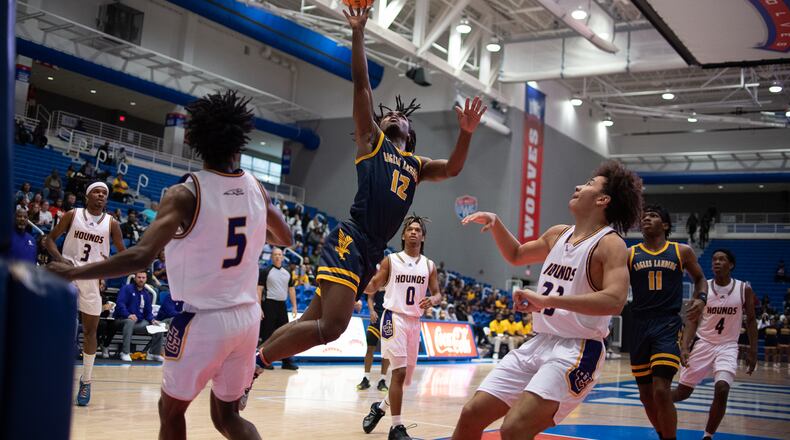 David Thomas for Eagles Landing takes a shot during the GHSA AAAAA boys Jones County vs Eagles Landing basketball playoff game at the University of West Gerogia in Carrolton, March 3, 2023. Jamie Spaar for the Atlanta Journal-Constitution