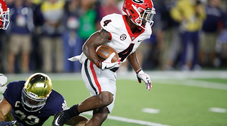 Mecole Hardman #4 of the Georgia Bulldogs returns a kick against the Notre Dame Fighting Irish in the second quarter of a game at Notre Dame Stadium on September 9, 2017 in South Bend, Indiana. (Photo by Joe Robbins/Getty Images)