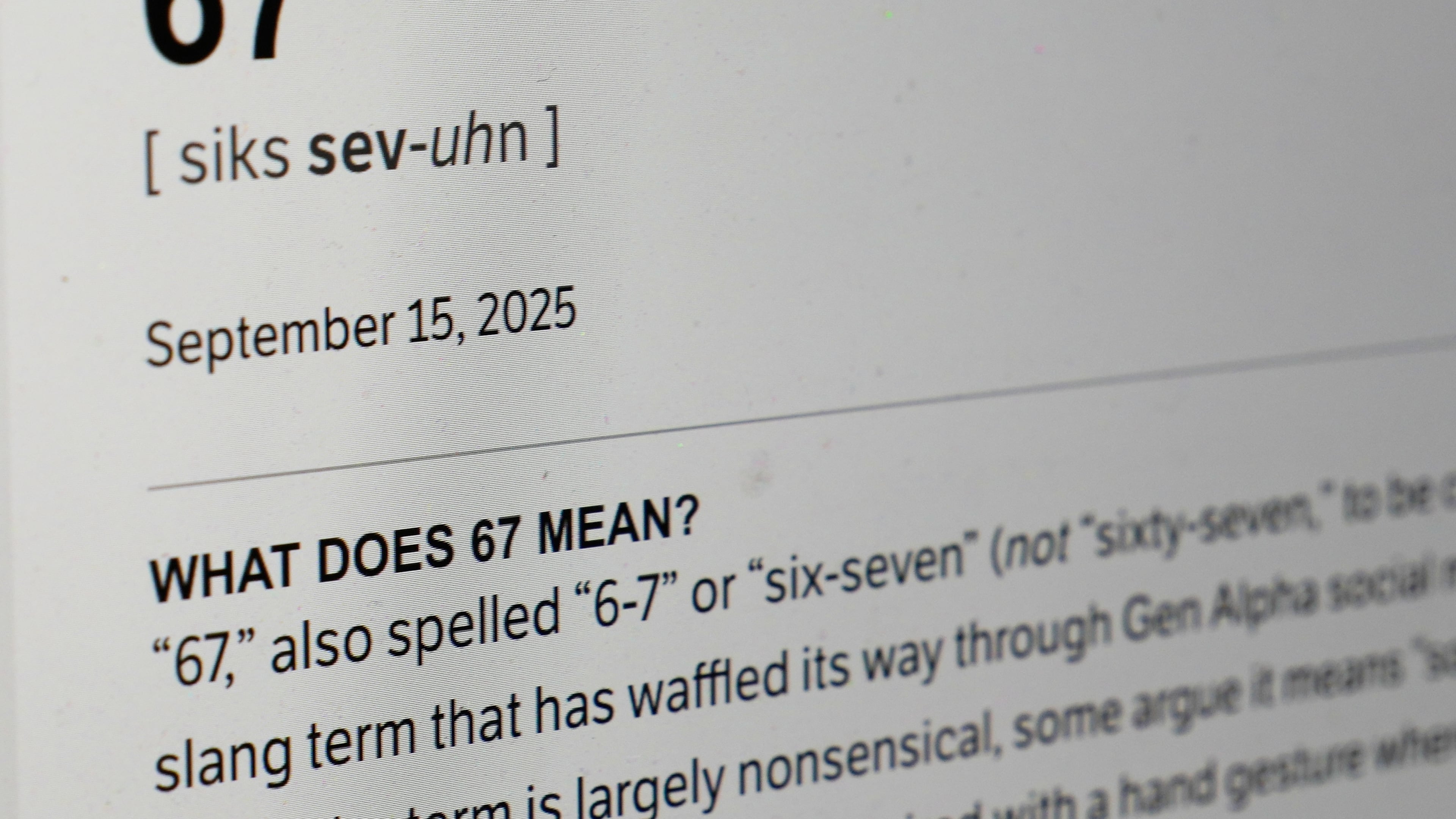 This Dictionary.com page shows the newest word of the year "6-7" on a computer screen, Thursday, Oct. 30, 2025, in Chicago. (AP Photo/Kiichiro Sato)