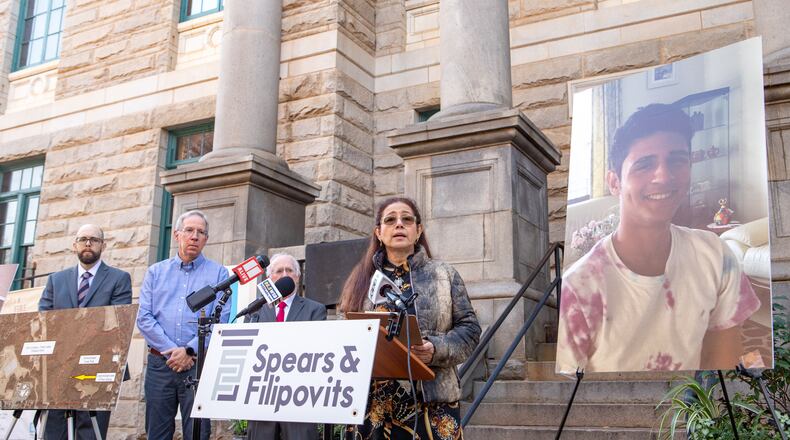 The family of Manuel Paez-Terán, known as Tortuguita, who was shot to death by Georgia State Patrol SWAT team members in 2023, gather outside the Decatur Courthouse to announce the filing of a lawsuit on Tuesday, Dec 17, 2024. Paez-Terán's mother, Belkis Terán, speaks about her son and recounts some of the details of the shooting during the news conference. (Jenni Girtman for the AJC)