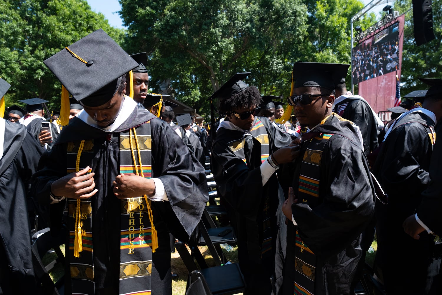 Students prepare to take the stage and receive their diplomas during the Morehouse College graduation Sunday, May 17, 2026. (Ben Gray for the AJC)