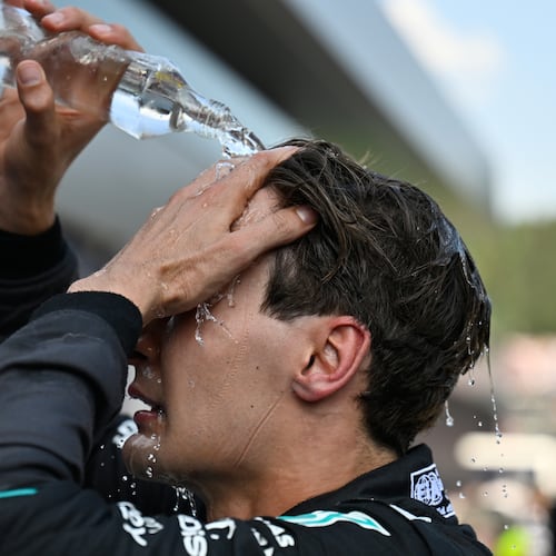 Race winner Mercedes driver George Russell of Britain refreshes himself after the Austrian F1 Grand Prix, in Spielberg, Austria, Sunday, June 28, 2026. (AP Photo/Denes Erdos)