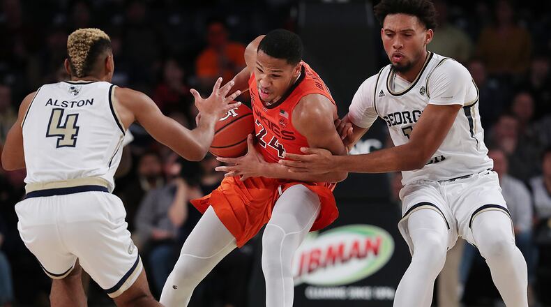 Jan. 09, 2019 Atlanta: Georgia Tech defenders Brandon Alston and James Banks III double team Virginia Tech forward Kerry Blackshear III during the second half in a NCAA basketball at McCamish Pavilion on Wednesday,  Jan. 9, 2019, in Atlanta.    Curtis Compton/ccompton@ajc.com