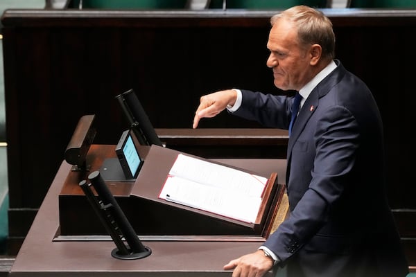 Poland's Prime Minister Donald Tusk addresses the Polish parliament on Wednesday, June 11, 2025, in Warsaw, Poland. (AP Photo/Czarek Sokolowski)