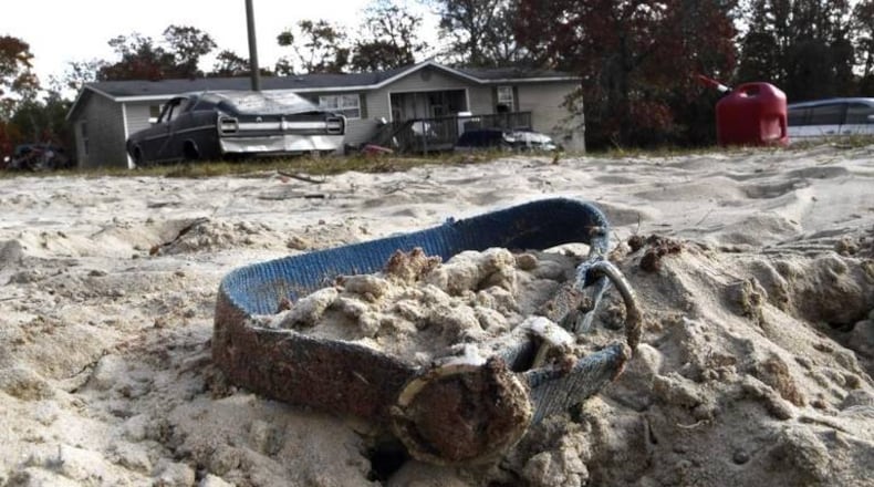 Joe Nate Goodwin said he decapitated his 2-year-old dog at the behest of sheriff’s deputies.