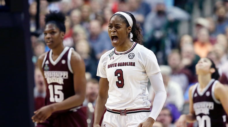 South Carolina guard Kaela Davis (3) celebrates a play during the second half against Mississippi State in the final of NCAA women's Final Four college basketball tournament, Sunday, April 2, 2017, in Dallas. (AP Photo/LM Otero)