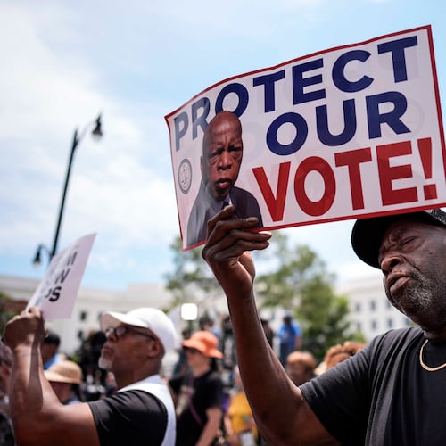 Aaron McGuire sings a spirtual song during a voting rally, Saturday, May 16, 2026, in Montgomery, Ala. (AP Photo/Mike Stewart)
