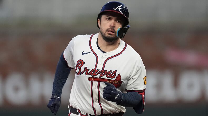 Travis d'Arnaud runs the bases after his fourth-inning home run during Monday's Braves-Marlins game at Truist Park. (AP Photo/John Bazemore)