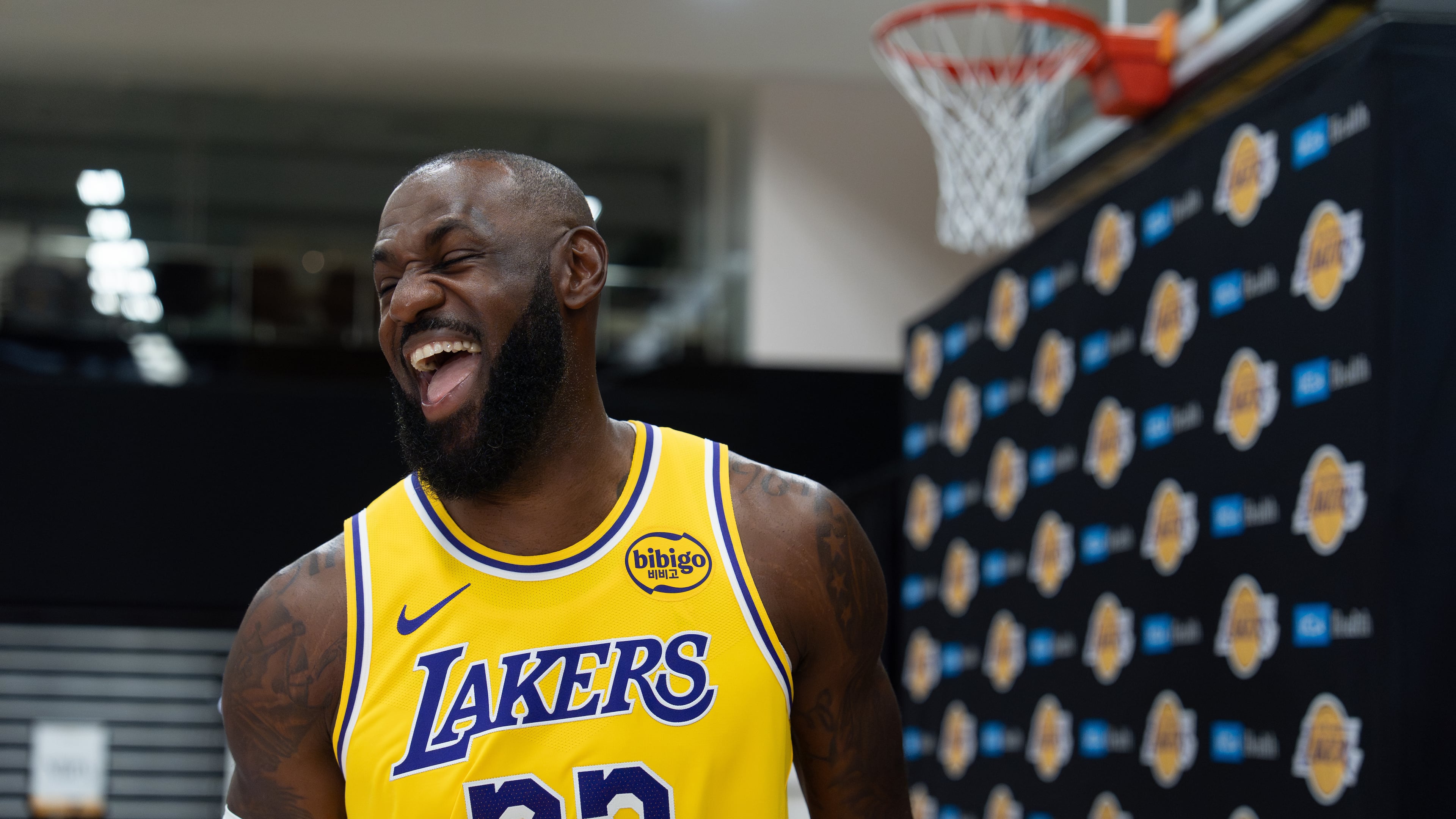 Los Angeles Lakers' LeBron James shares a laugh with a reporter during the NBA basketball team's media day in El Segundo, Calif., Monday, Sept. 29, 2025. (AP Photo/Jae C. Hong)
