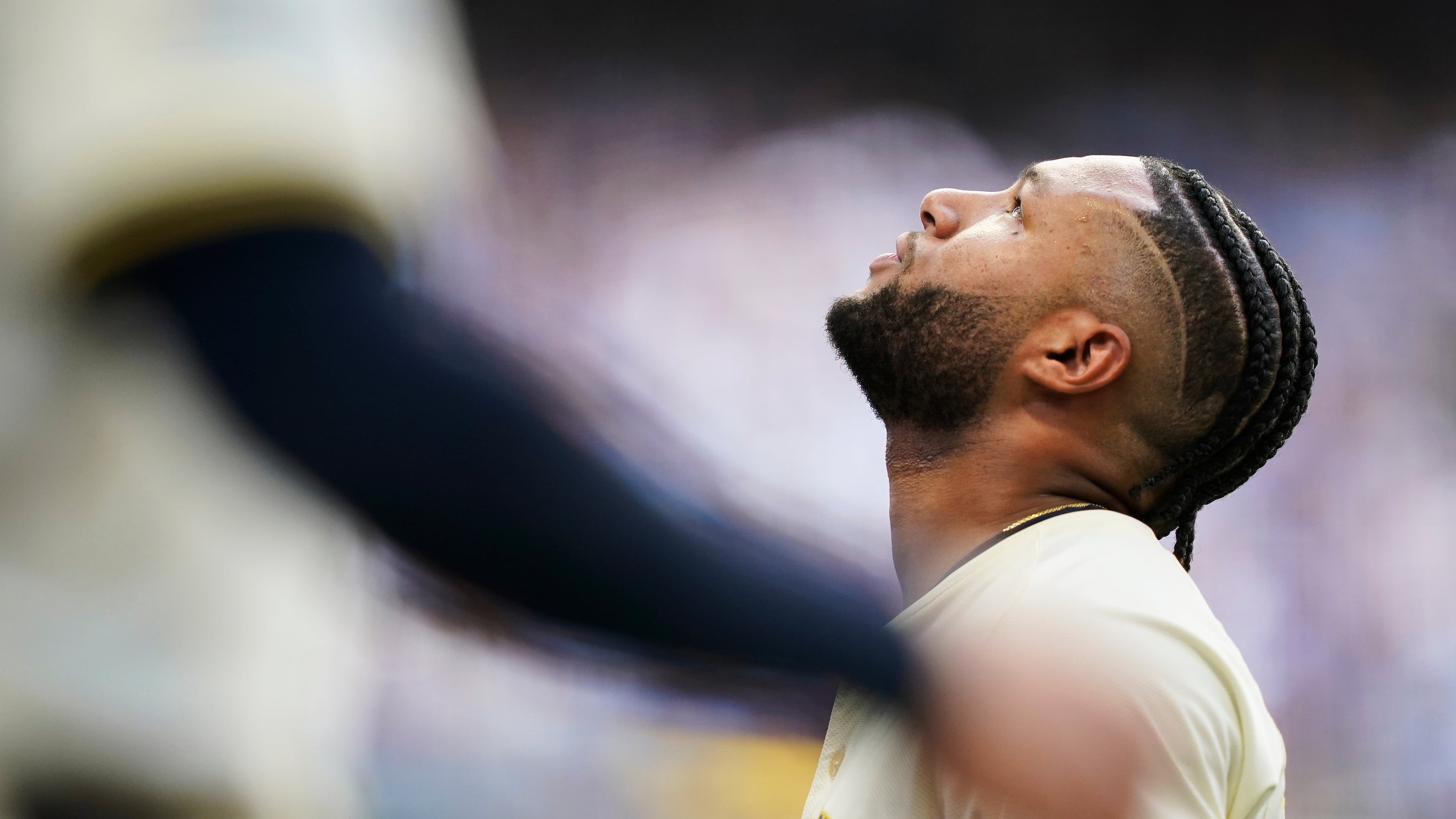 Milwaukee Brewers' Jackson Chourio (11) reacts to leaving the game with an injury during the second inning in Game 1 of baseball's National League Division Series game against the Chicago Cubs on Saturday, Oct. 4, 2025, in Milwaukee. (AP Photo/Kayla Wolf)