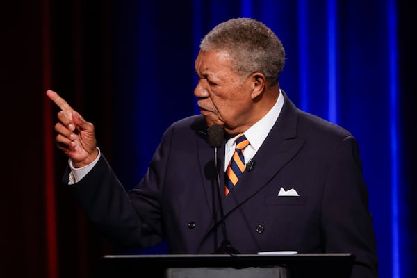 Fulton County Commission chair candidate Robb Pitts, the incumbent, points his finger at challenger Mo Ivory at the Atlanta Press Club Loudermilk-Young Debate Series at Georgia Public Broadcasting in Atlanta on June 1, 2026. (Arvin Temkar/AJC)