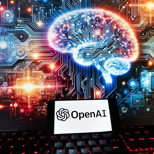 FILE - The OpenAI logo is displayed on a cell phone with an image on a computer monitor generated by ChatGPT's Dall-E text-to-image model, Friday, Dec. 8, 2023, in Boston. (AP Photo/Michael Dwyer, File)