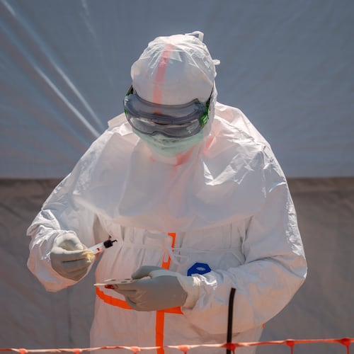 FILE - A health worker prepares a patient's blood sample for testing at Bunia General Hospital in Bunia, Congo, Thursday, June 11, 2026. (AP Photo/Moses Sawasawa, File)