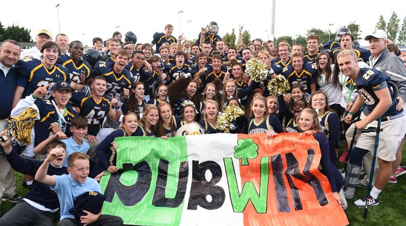Marist School football players, cheerleaders and chaperones celebrate the school’s win over Miami’s Belen Jesuit in a game in the Aer Lingus College Football Classic,in Dublin, Ireland.