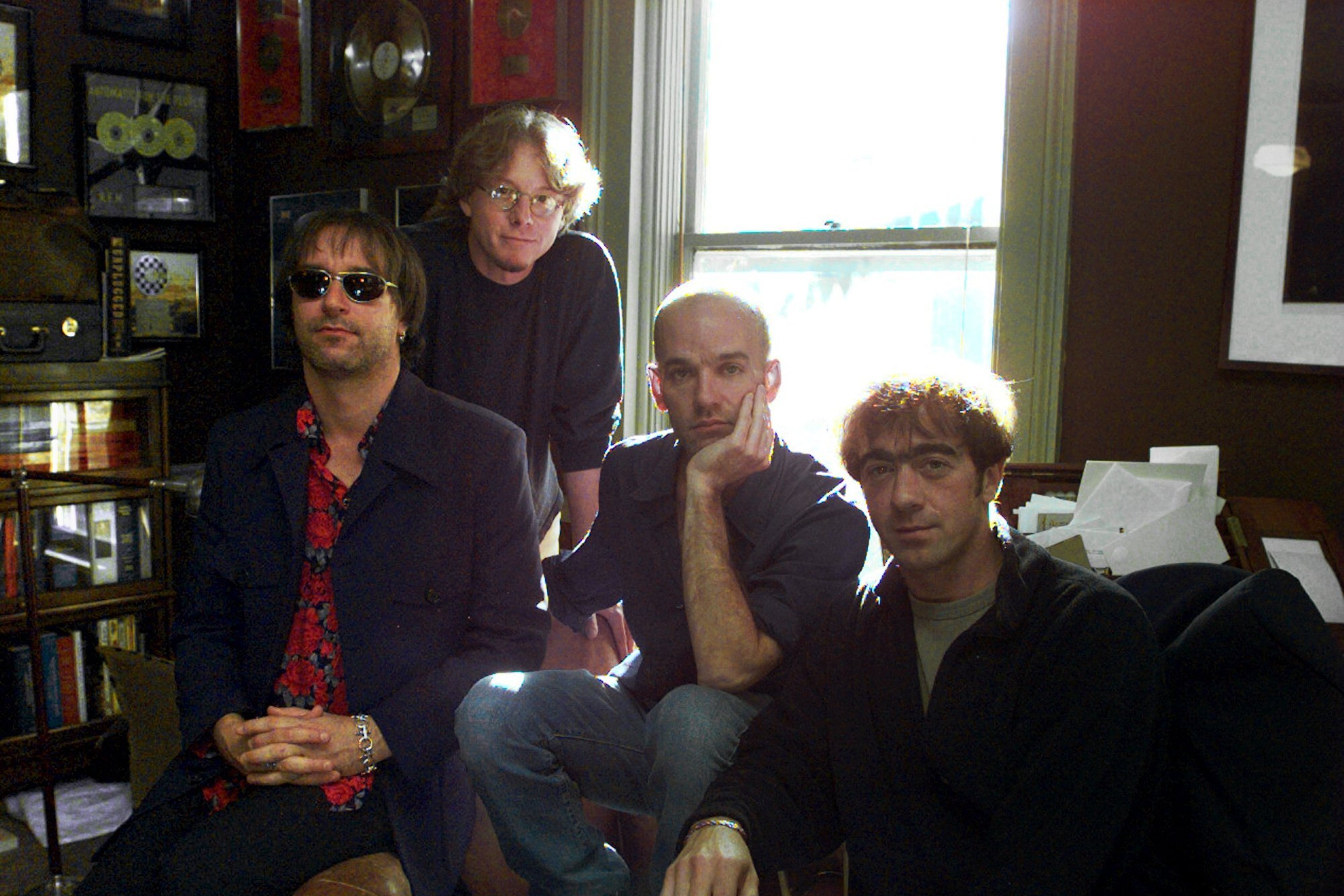 Peter Buck (from left), Mike Mills, Michael Stipe and Bill Berry formed R.E.M. in 1980 in Athens while they were students at the University of Georgia. (AJC File)