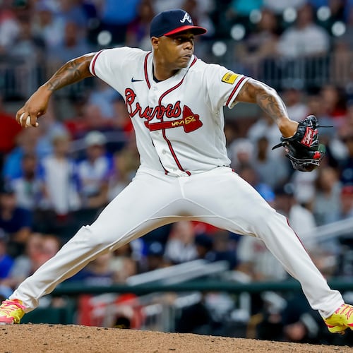 Atlanta Braves pitcher Raisel Iglesias (26) delivers to a Los Angeles Dodgers batter during the ninth inning of a baseball game, Tuesday, Aug. 25, 2026, in Atlanta. (AP Photo/Erik S. Lesser)