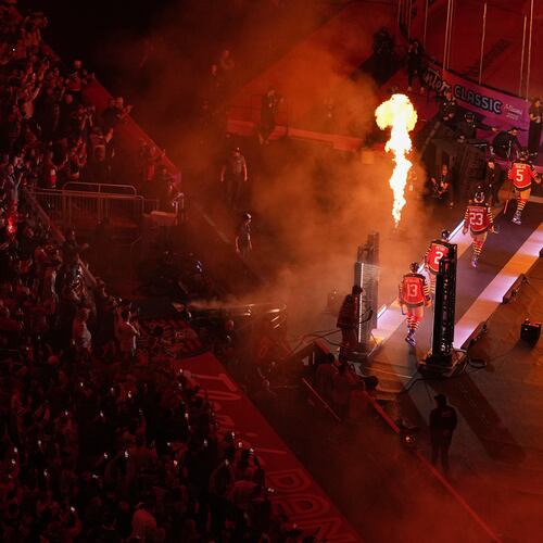 Florida Panthers players walk to the ice before the NHL Winter Classic outdoor hockey game between the Florida Panthers and the New York Rangers, Friday, Jan. 2, 2026, in Miami. (AP Photo/Rebecca Blackwell)