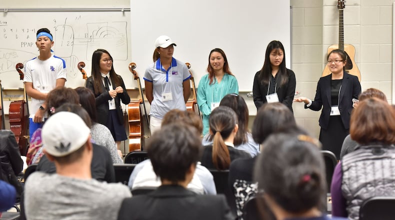 October 25, 2016 Suwanee - Students share their thoughts before Korean parents during Korean Parent Night, which entire information was provided in Korean, at Peachtree Ridge High School on Tuesday, October 25, 2016. “There is a gap in the first-generation about knowing how important internships are for college applications and knowing what is successful in America, ” said assistant principal Jennifer Fero, who is organizing the session. About 20 percent of the school’s enrollment is Asian. HYOSUB SHIN / HSHIN@AJC.COM