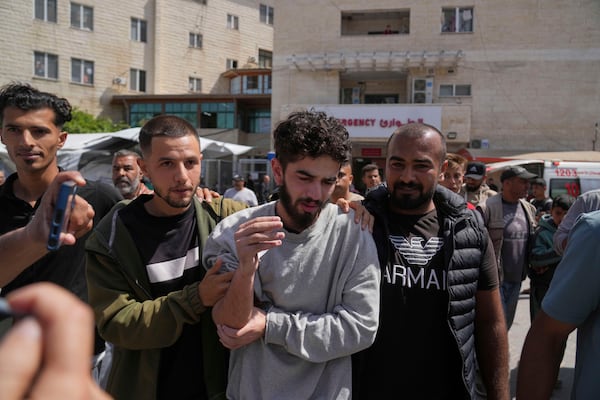 Freed Palestinian prisoner Mohammad Hijazi, who was detain by the Israeli army during its ground operation in the Gaza Strip, arrives at al-Aqsa Hospital in Deir al-Balah, central Gaza, after his release from an Israeli prison, Tuesday, April 29, 2025. (AP Photo/Abdel Kareem Hana)