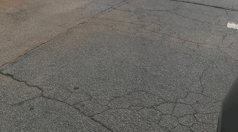 A reader hopes this steel plate will soon be removed in Senoia. Photo/Submitted.