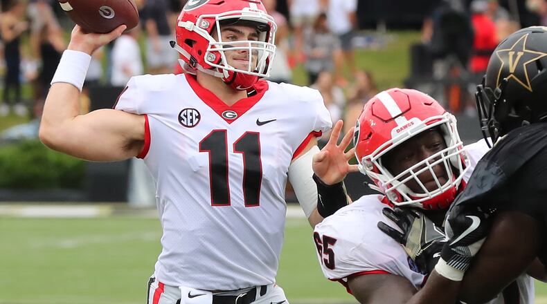 October 7, 2017 Nashville: Georgia quarterback Jake Fromm completes a pass against Vanderbilt during the first half in a NCAA college football game on Saturday, October 7, 2017, in Nashville. Curtis Compton/ccompton@ajc.com