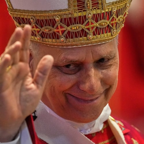 Pope Leo XIV waves to faithful at the end of the Pentecost Mass in St. Peter's Basilica, at the Vatican, Sunday, May 24, 2026. (AP Photo/Gregorio Borgia)