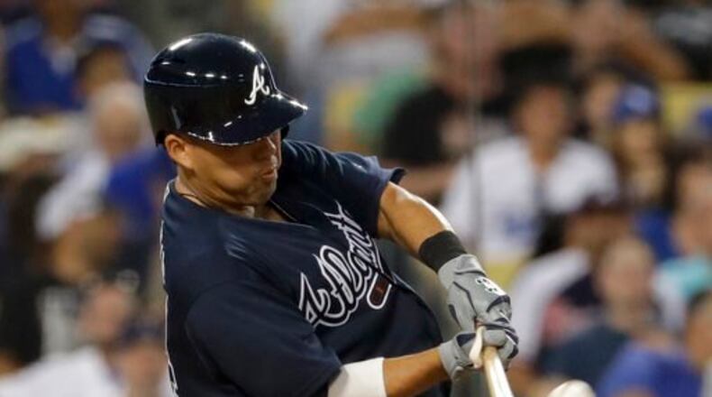 Kurt Suzuki hit a decisive two-run homer in the fourth inning of the Braves’ 6-3 win Thursday. The veteran catcher went on the bereavement list after the game and was headed to Hawaii for his grandfather’s funeral. (AP Photo/Chris Carlson)
