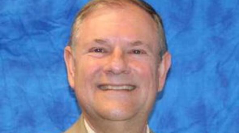 Forsyth County finance director David Gruen presented the final millage figures to commissioners.