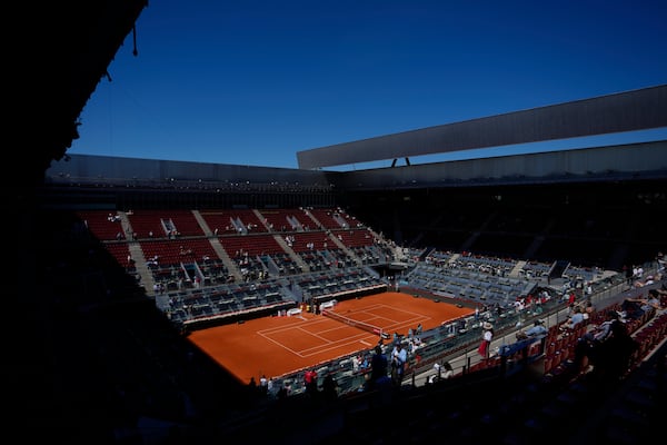 The Madrid Open tennis tournament venue is empty during a general blackout in Madrid, Monday, April 28, 2025. (AP Photo/Manu Fernandez)