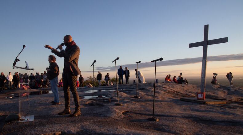 Montell Jordan delivers the Message to the crowd at the 75th Annual Easter Sunrise Service on the top of Stone Mountain last year. Jordan, a former Billboard Top Ten artist, now serves as executive pastor for Victory World Church in Norcross. A similar Easter service at Kennesaw Mountain National Battlefield Park has been canceled, and the Stone Mountain service could be canceled this year due to the coronavirus. STEVE SCHAEFER / SPECIAL TO THE AJC